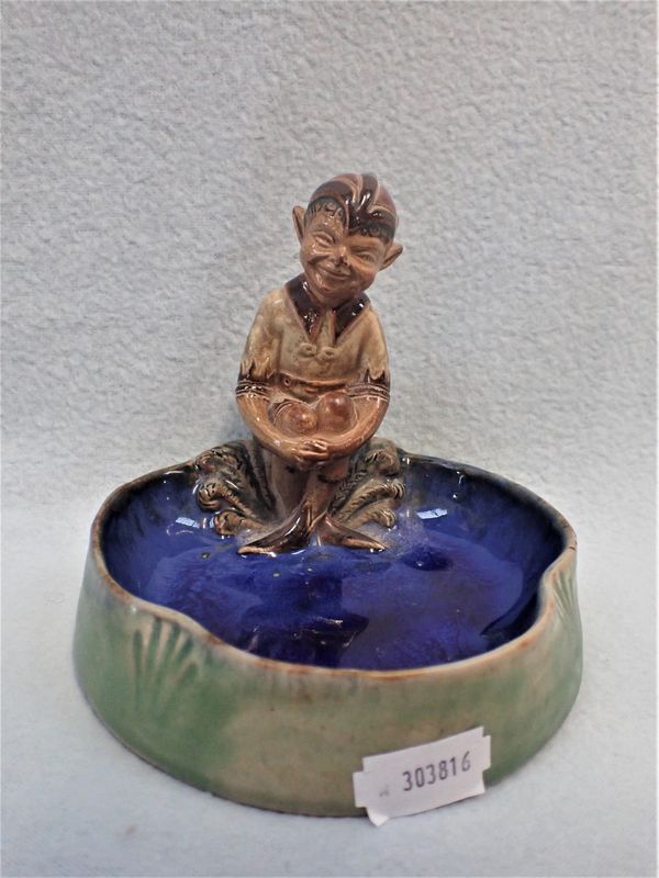 A DOULTON LAMBETH STONEWARE PIXIE ASHTRAY