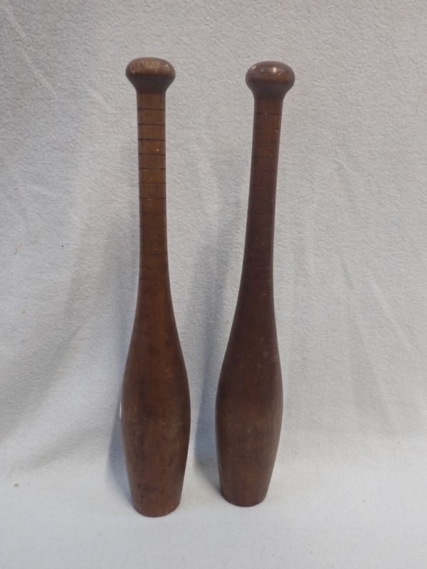 A PAIR OF VINTAGE JUGGLING/EXERCISE CLUBS