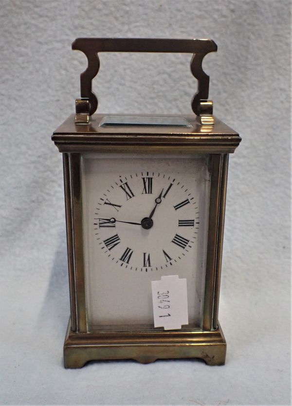 A BRASS CARRIAGE CLOCK