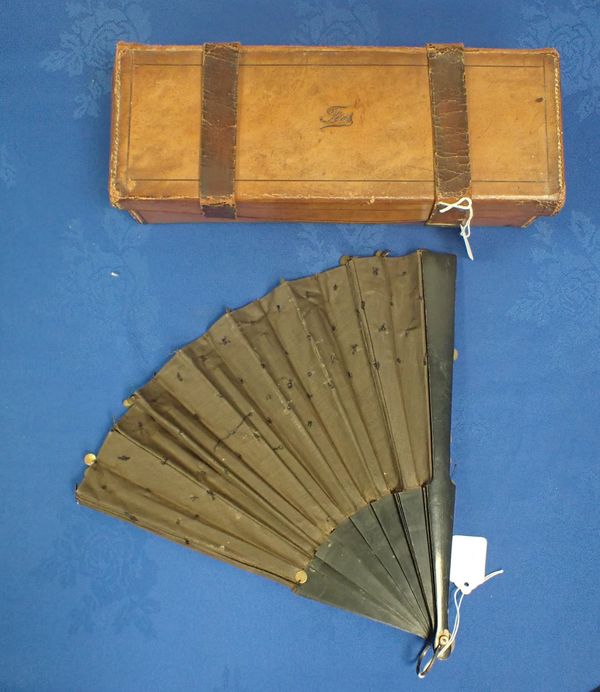 LEATHER TIE BOX AND A FAN