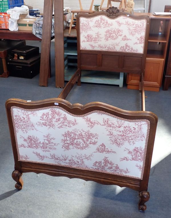 A PAIR OF FRENCH PROVINCIAL STYLE CARVED BEECHWOOD SINGLE BEDS