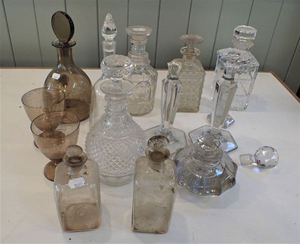 A COLLECTION OF GLASS DECANTERS