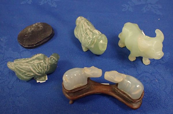 A GROUP OF CARVED JADE OXEN