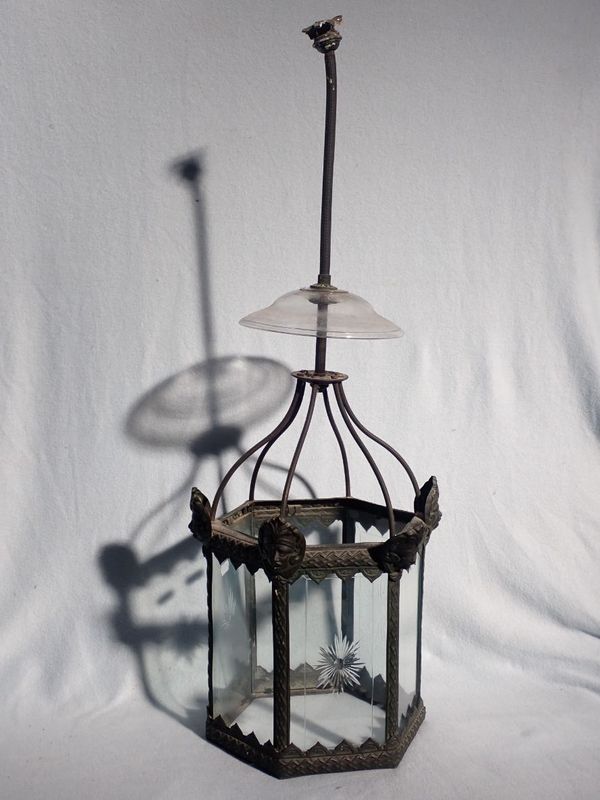 AN EDWARDIAN HEXAGONAL METAL FRAMED HALL LANTERN