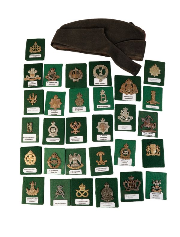 A COLLECTION OF 64 BRITISH CAP BADGES.