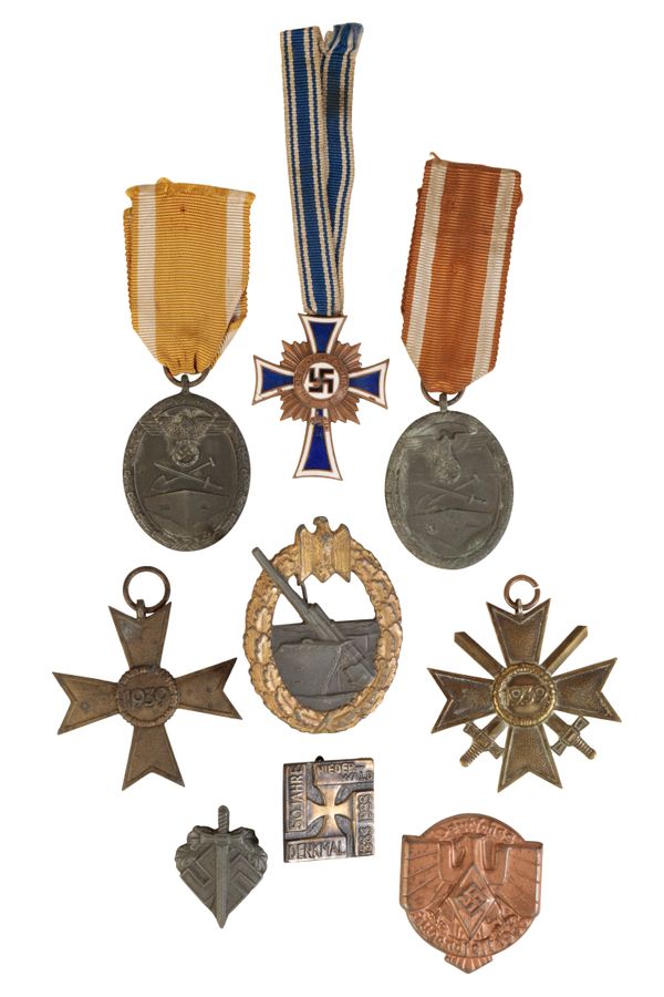 A COLLECTION OF THIRD REICH BADGES AND MEDALS