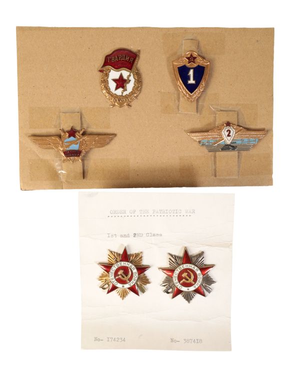 A COLLECTION OF RUSSIAN BADGES.