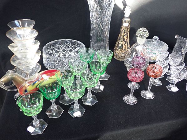 A SET OF NINE GREEN TINTED DRINKING GLASSES