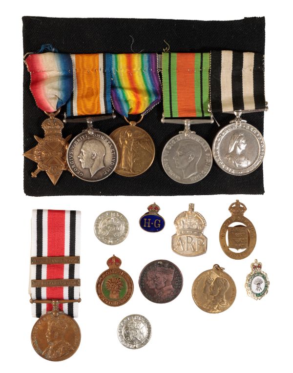 A GREAT WAR MEDAL GROUP AND COLLECTION OF HOME FRONT BADGES.