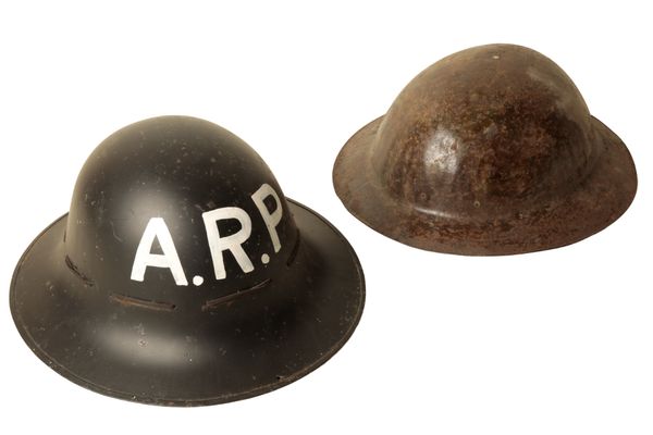 A SECOND WORLD WAR MILITARY TIN HELMET