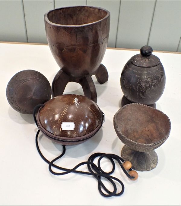 A COLLECTION OF CARVED COCONUT SHELL BOWLS