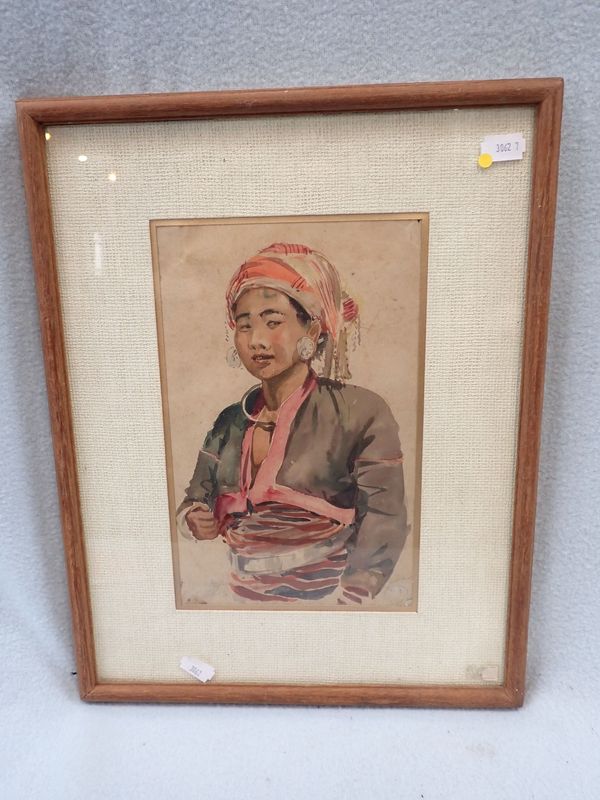 A WATERCOLOUR PORTRAIT OF AN ASIAN WOMAN