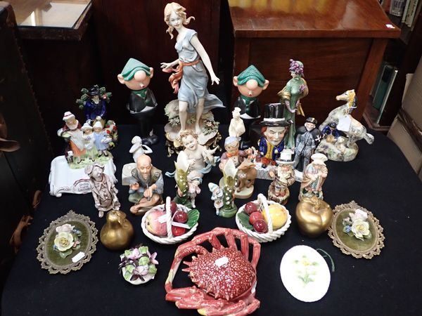 A COLLECTION OF FIGURINES