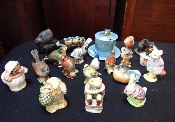 A COLLECTION OF BESWICK BIRDS AND BEATRIX POTTER FIGURES