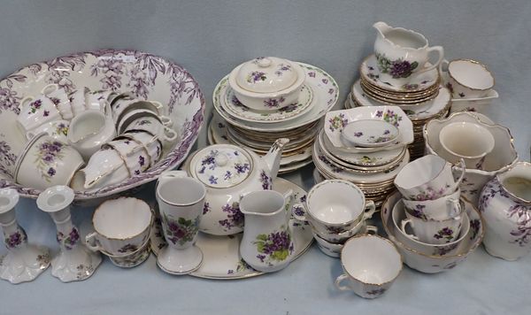 A COLLECTION OF DINNER AND TEAWARE DECORATED WITH VIOLETS