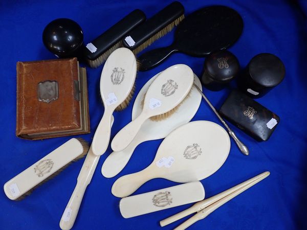 A COLLECTION OF EBONY, IVORY AND OTHER DRESSING TABLE ITEMS