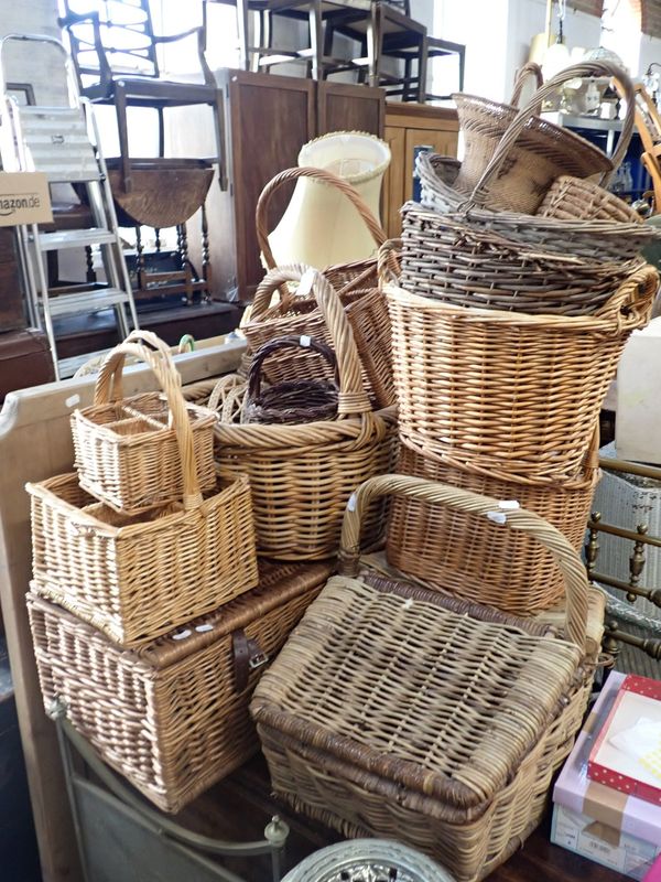 A COLLECTION OF WICKER BASKETS