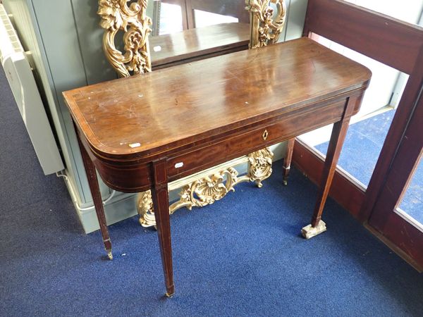 A GEORGE III MAHOGANY TEA TABLE