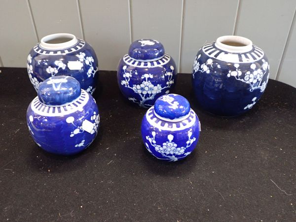 A COLLECTION OF CHINESE BLUE AND WHITE PRUNUS GINGER JARS