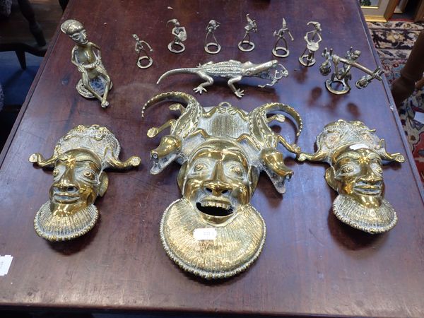 A COLLECTION OF TRIBAL CAST BRASS ARTEFACTS