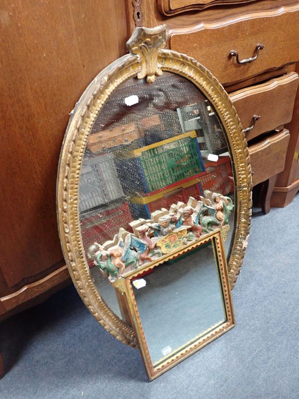 A SMALL PAINTED AND GILT WALL MIRROR