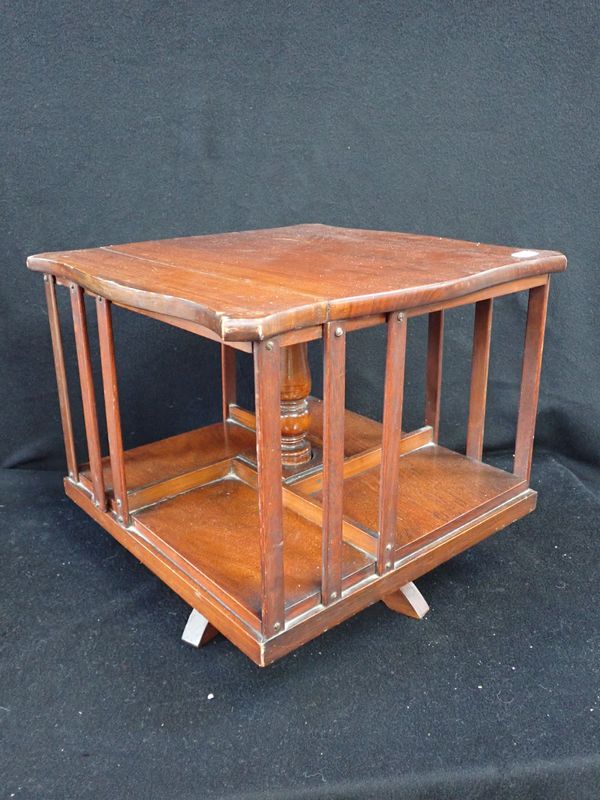 AN  EDWARDIAN MAHOGANY TABLE-TOP REVOLVING BOOKCASE