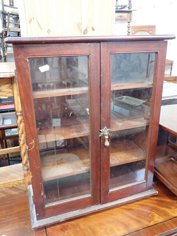 A SMALL VICTORIAN GLAZED  MAHOGANY CABINET