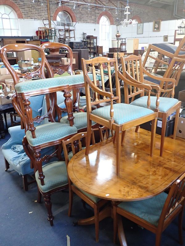 A REPRODUCTION YEW DINING TABLE AND CHAIRS