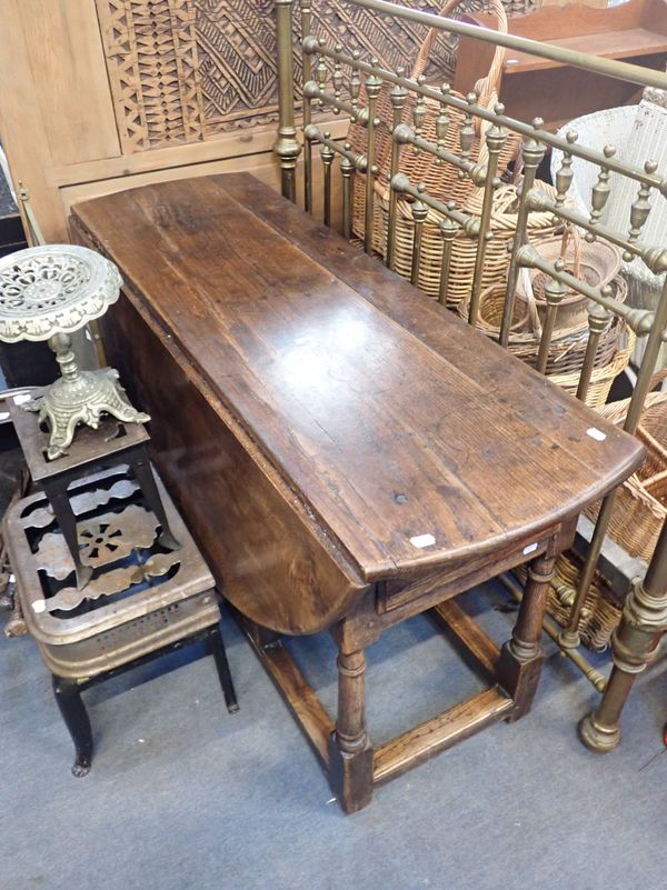 A 17TH CENTURY AND LATER OAK GATELEG TABLE