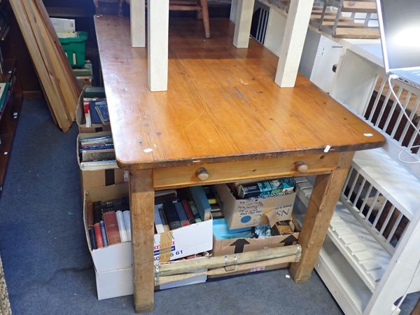 A LARGE PINE KITCHEN TABLE