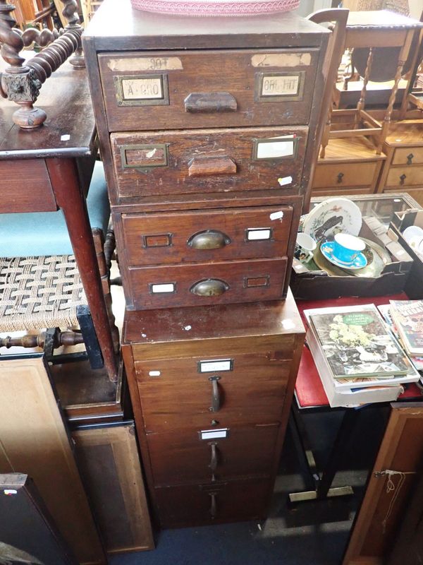 TWO SIMILAR SETS OF 1920S OAK FILING DRAWERS