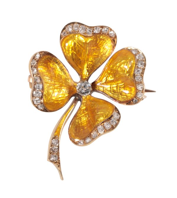 A GUILLOCHE ENAMEL AND DIAMOND CLOVER LEAF BROOCH