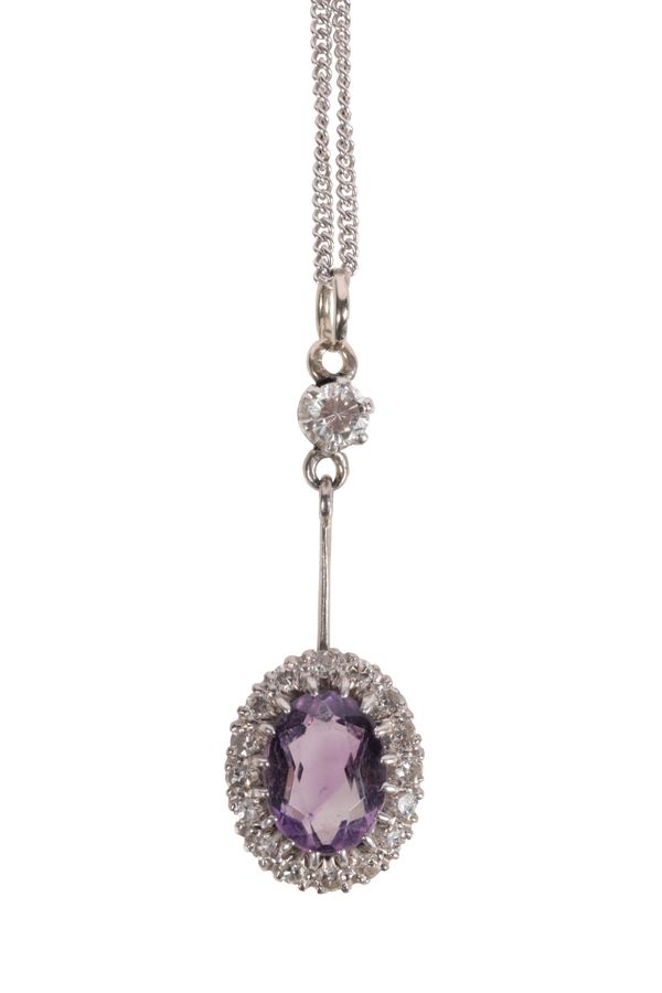 AN AMETHYST AND DIAMOND CLUSTER PENDANT NECKLACE