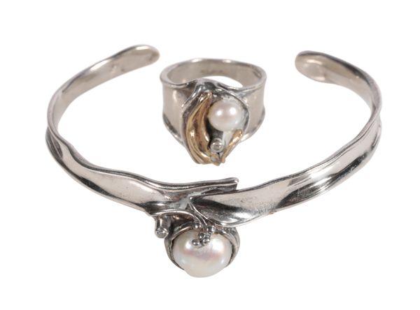 A HAND CRAFTED SILVER PEARL AND DIAMOND TORQUE BANGLE