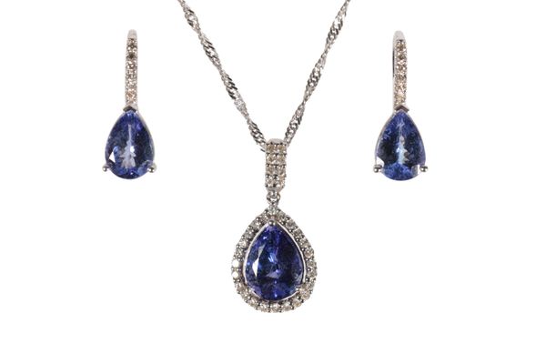 A TANZANITE AND DIAMOND  CLUSTER PENDANT WITH EARRINGS ENSUITE