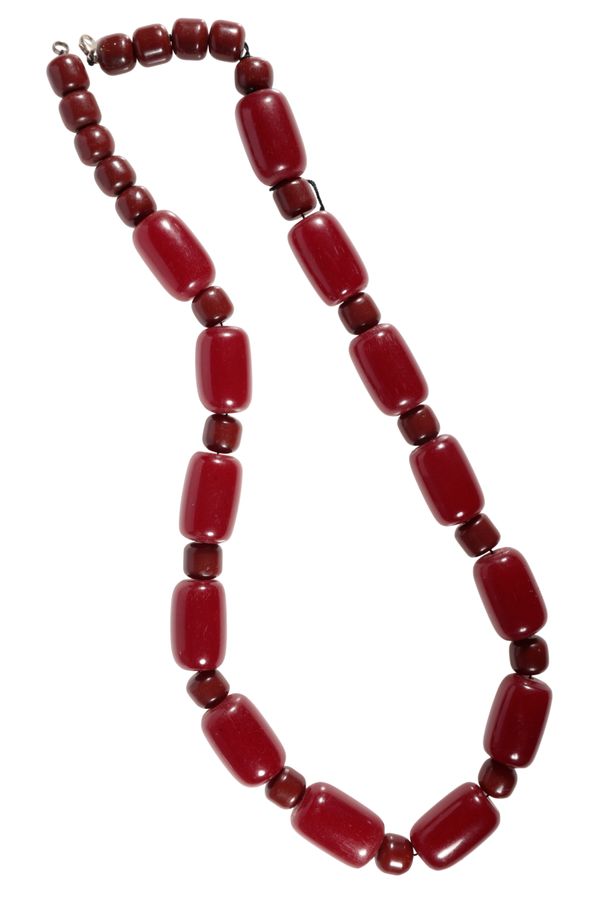 A CHERRY AMBER BEAD NECKLACE