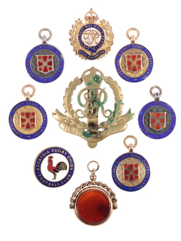 THREE 9CT GOLD AND ENAMEL RUGBY MEDALS