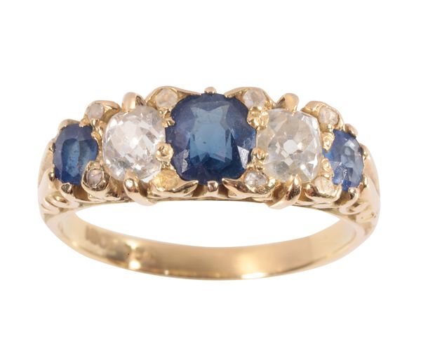 A FIVE STONE SAPPHIRE AND DIAMOND RING