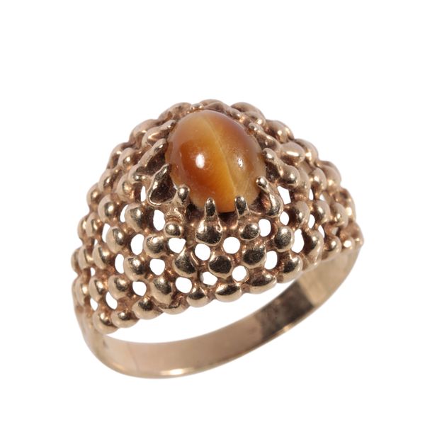 A GOLD TIGERS EYE DRESS RING