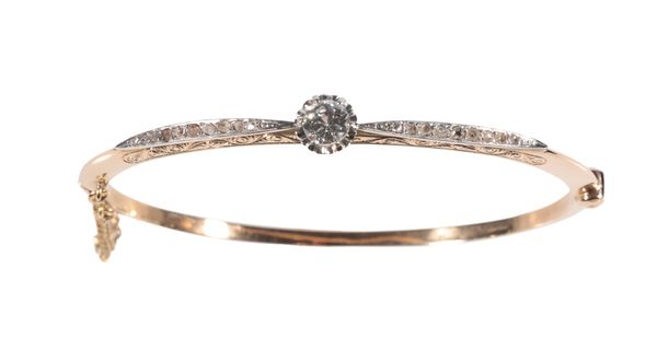 A DIAMOND HALF SET HINGED BANGLE