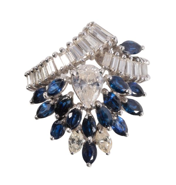 A SAPPHIRE AND DIAMOND CLUSTER RING