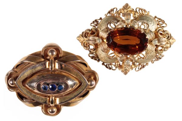 A TOPAZ ETRUSCAN STYLE BROOCH