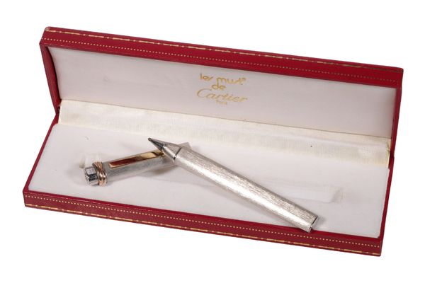 CARTIER: 'LES MUST DE CARTIER' SILVER AND GOLD PLATED BALLPOINT PEN