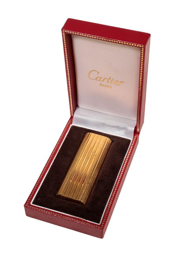 CARTIER: A GOLD PLATED CIGARETTE LIGHTER