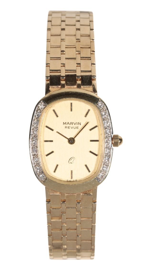 MARVIN: A 14CT GOLD LADY'S BRACELET WATCH