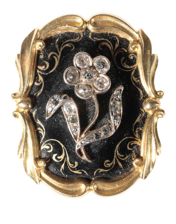 A VICTORIAN ENAMEL AND DIAMOND MOURNING BROOCH