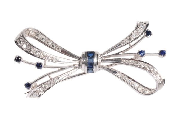 A SAPPHIRE AND DIAMOND BOW BROOCH