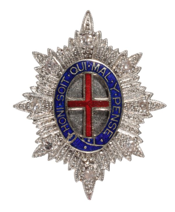 A DIAMOND AND ENAMEL REGIMENTAL BROOCH