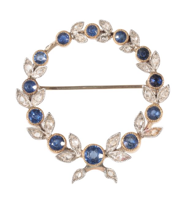 AN EDWARDIAN SAPPHIRE AND DIAMOND CIRCLET BROOCH