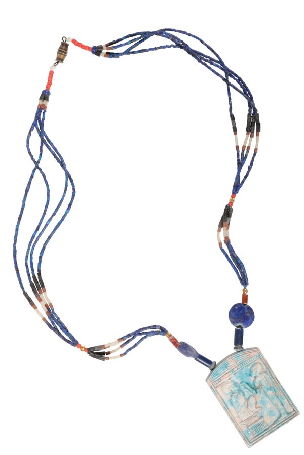 AN EGYPTIAN BEAD NECKLACE WITH LATER TABLET PENDANT